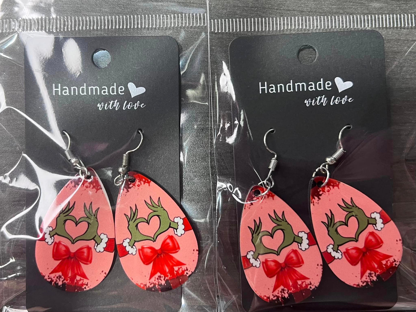 Grinch heart hand earrings